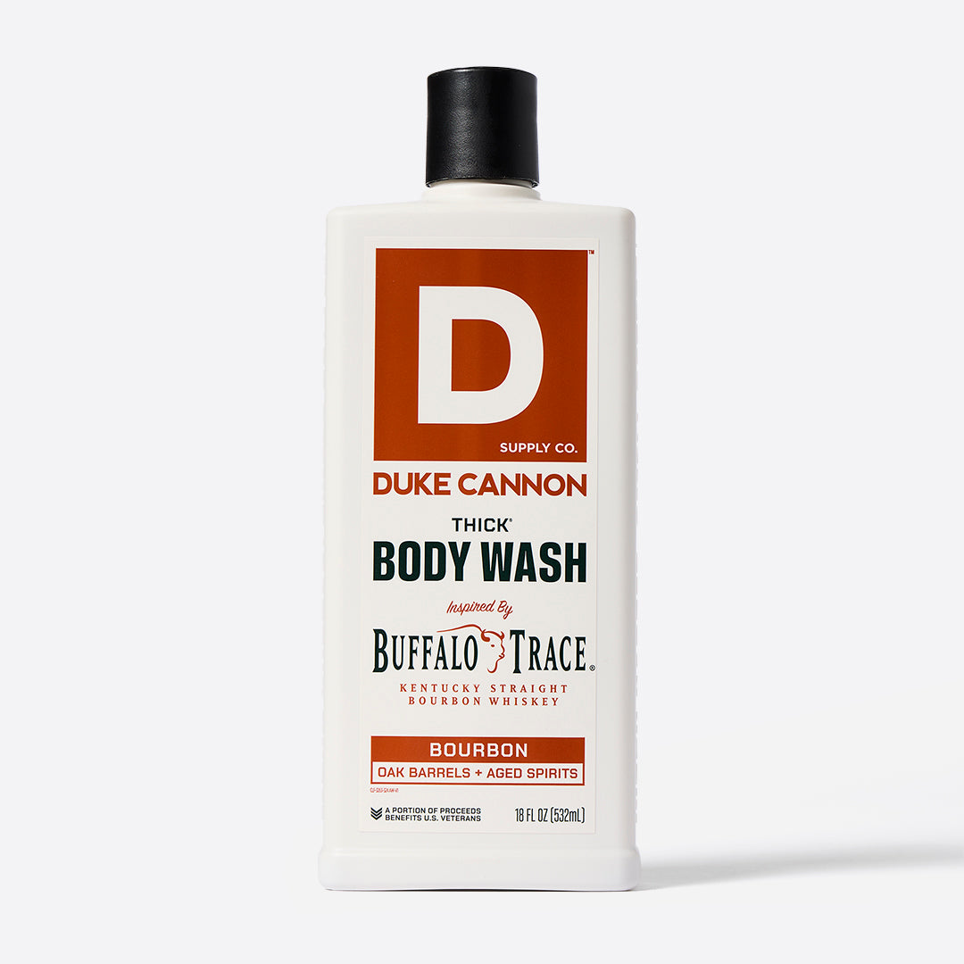Bottle of Duke Cannon Thick Body Wash in the Bourbon Scent on a white background. Bourbon - Oak Barrels + Aged Spirits scent. Inspired by Buffalo Trace Kentucky Straight Bourbon Whiskey.